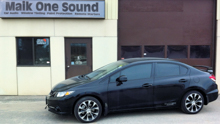 Black 2013 Honda Civic SI with dark automotive window film